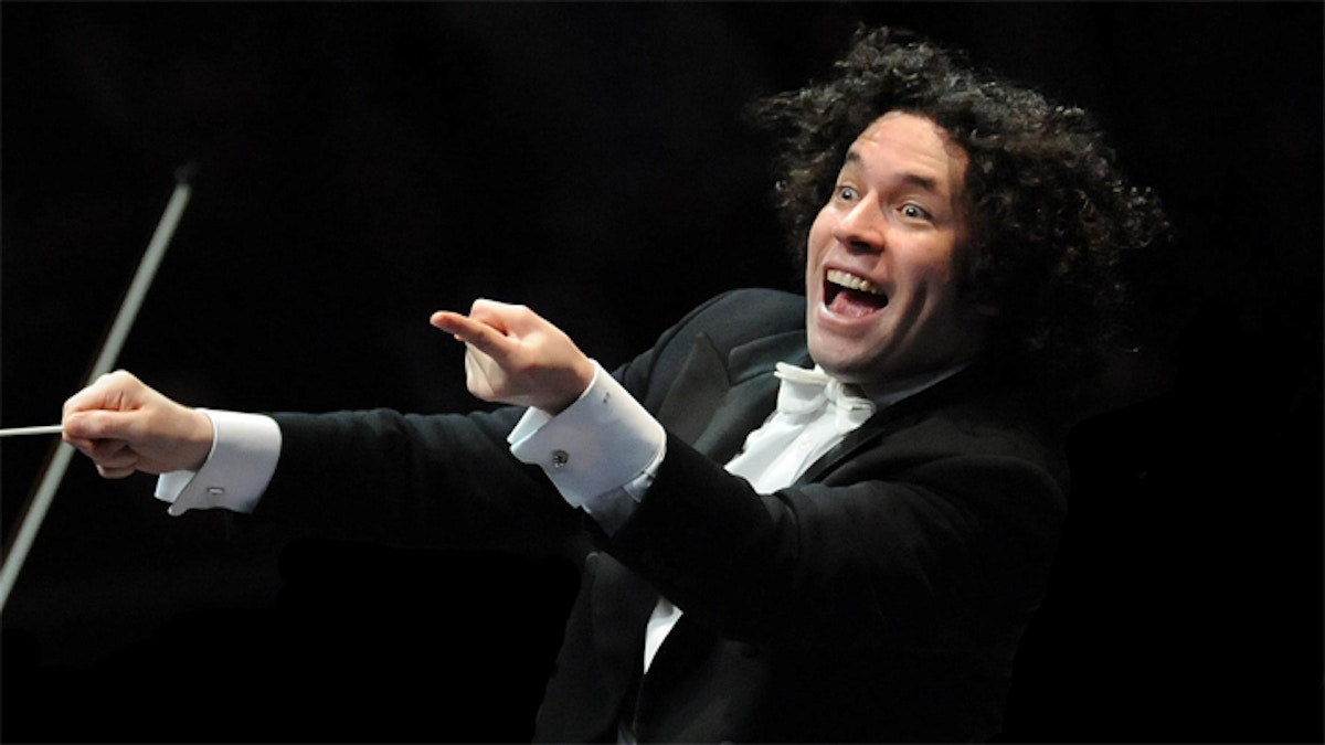 The Venezuelan conductor Gustavo Dudamel (C), his wife, the